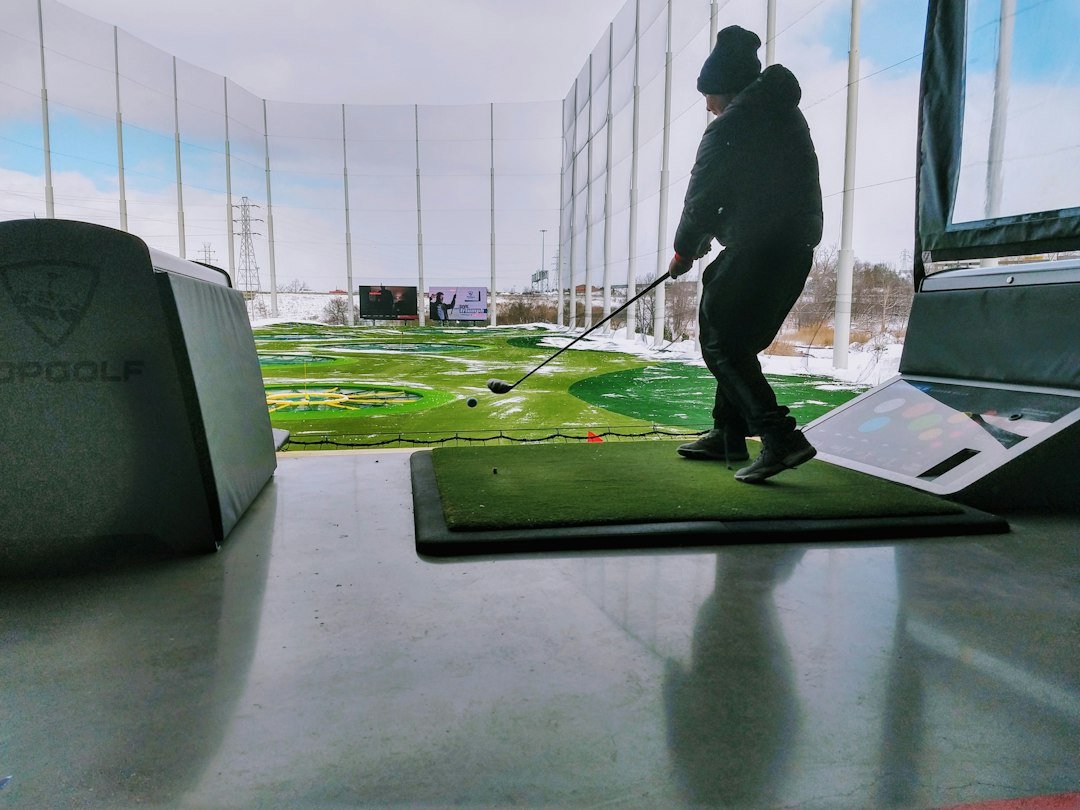 The Art of Drawing Readers In: Your attractive post title goes here The golf club swings through the air on a chilly, snowy day at TopGolf